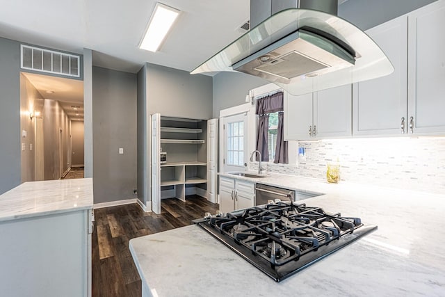 2046 Courtland Pl, Memphis, TN 38104 - kitchen with a sink, stovetop, dishwasher, and white cabinets