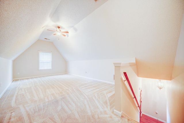 130 Pinehurst Dr, Oakland, TN 38060 - additional living space featuring vaulted ceiling, baseboards, carpet floors, ceiling fan, and a textured ceiling