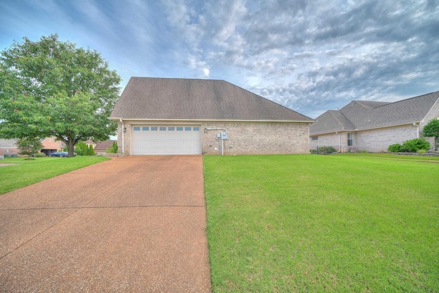 130 Pinehurst Dr, Oakland, TN 38060 - view of front facade featuring a front yard, concrete driveway, and brick siding