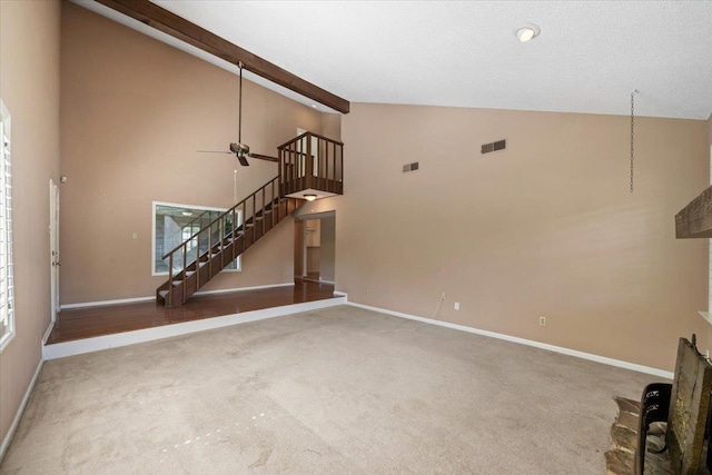 8174 Ravenhill Dr Unit 54, Germantown, TN 38138 - unfurnished living room featuring stairs, a ceiling fan, high vaulted ceiling, baseboards, and carpet flooring