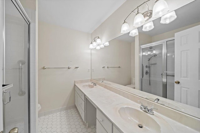 8174 Ravenhill Dr Unit 54, Germantown, TN 38138 - full bath with toilet, a stall shower, double vanity, and baseboards