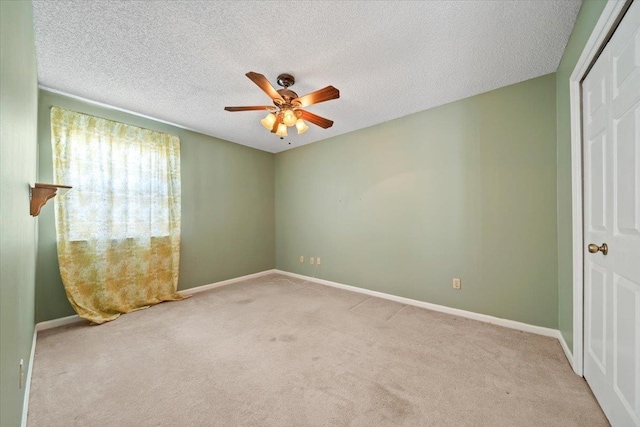 8174 Ravenhill Dr Unit 54, Germantown, TN 38138 - unfurnished room featuring carpet floors, ceiling fan, baseboards, and a textured ceiling