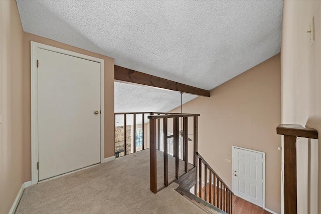 8174 Ravenhill Dr Unit 54, Germantown, TN 38138 - hall with a textured ceiling, an upstairs landing, and carpet flooring
