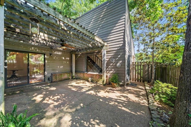 8174 Ravenhill Dr Unit 54, Germantown, TN 38138 - rear view of house with a ceiling fan, a patio, and stairway