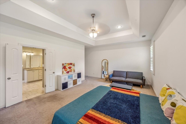 1668 Jennings Mill Ln, Collierville, TN 38017 - bedroom with light carpet, a raised ceiling, recessed lighting, baseboards, and connected bathroom