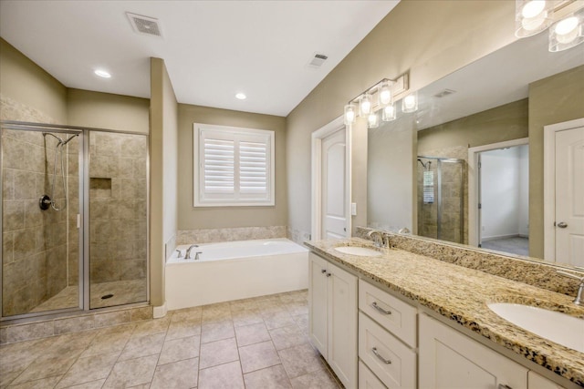 1668 Jennings Mill Ln, Collierville, TN 38017 - bathroom with a shower stall, a bath, double vanity, and tile patterned flooring