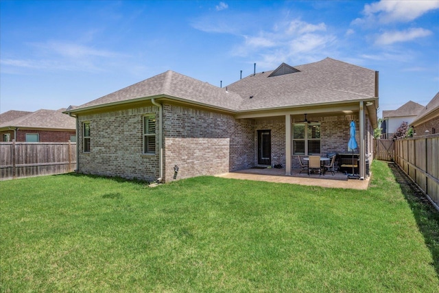 1668 Jennings Mill Ln, Collierville, TN 38017 - back of house with brick siding, a patio area, and a shingled roof