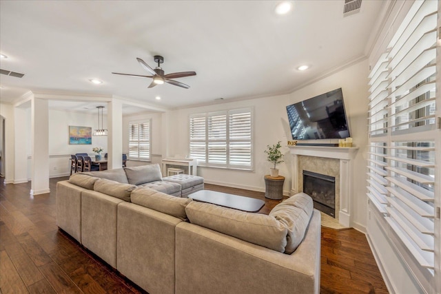 1668 Jennings Mill Ln, Collierville, TN 38017 - living room with a high end fireplace, crown molding, ceiling fan, dark wood-style floors, and recessed lighting