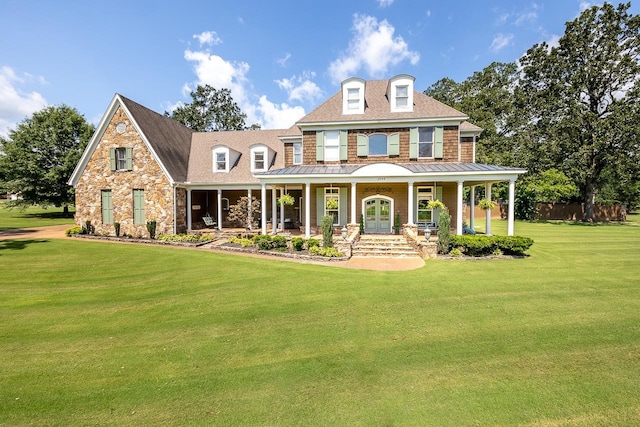 1245 Auburn Woods Dr, Collierville, TN 38017 - view of front of home featuring a porch, a standing seam roof, and metal roof