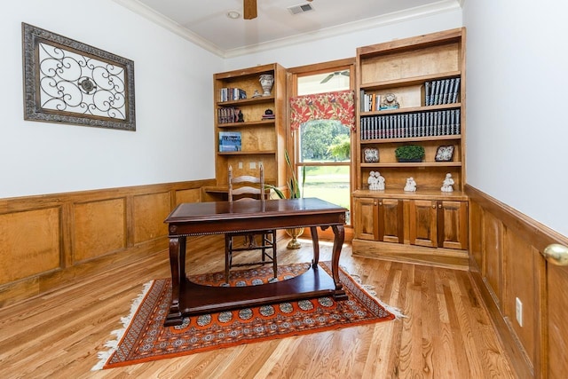 1245 Auburn Woods Dr, Collierville, TN 38017 - home office featuring wainscoting, crown molding, and light wood-style floors