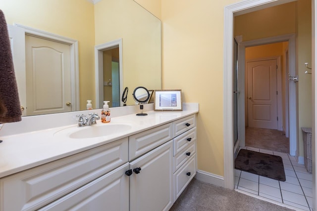 1245 Auburn Woods Dr, Collierville, TN 38017 - bathroom featuring vanity, tile patterned floors, and baseboards