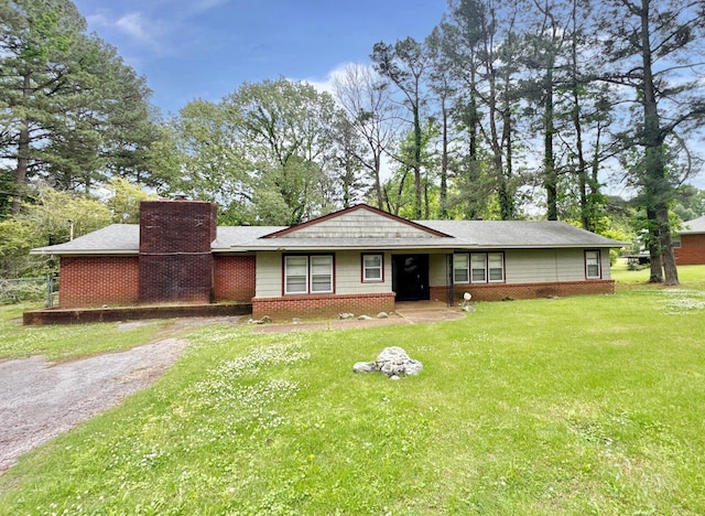 3751 Lakewood Dr N, Memphis, TN 38128 - ranch-style house with brick siding, a front lawn, and a chimney