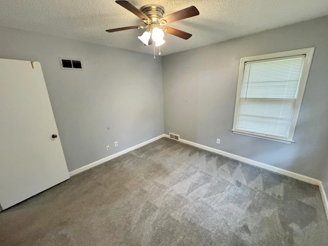 3751 Lakewood Dr N, Memphis, TN 38128 - carpeted spare room featuring ceiling fan, baseboards, and a textured ceiling