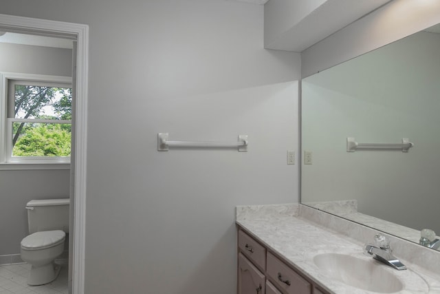 8432 Wood Shadows Ln, Memphis, TN 38018 - bathroom with toilet, vanity, and tile patterned floors