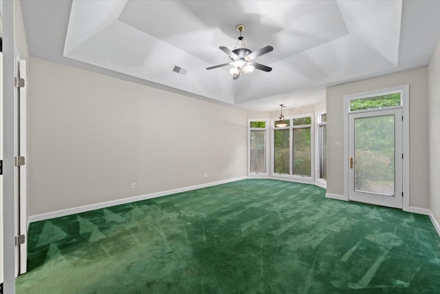 3559 Windgarden Cv, Memphis, TN 38125 - empty room with a tray ceiling, carpet, baseboards, and ceiling fan