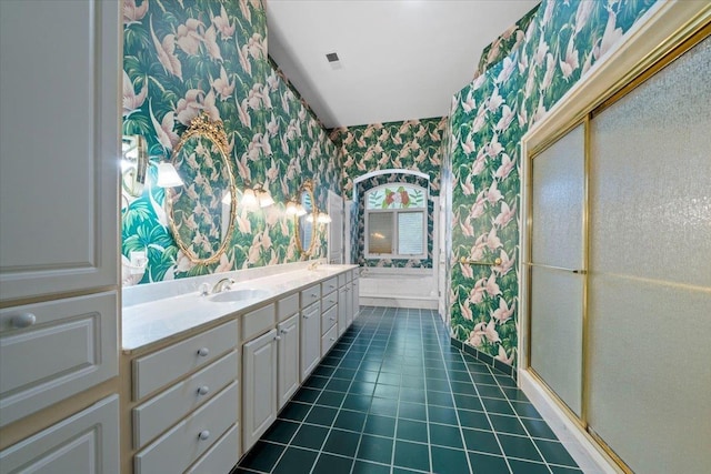 3559 Windgarden Cv, Memphis, TN 38125 - full bath with wallpapered walls, double vanity, and tile patterned floors