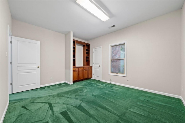 3559 Windgarden Cv, Memphis, TN 38125 - unfurnished bedroom with dark carpet and baseboards