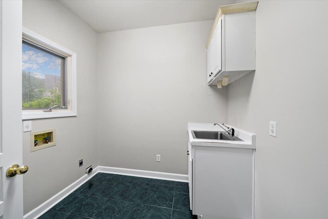 3559 Windgarden Cv, Memphis, TN 38125 - laundry area with washer hookup, cabinet space, electric dryer hookup, and baseboards
