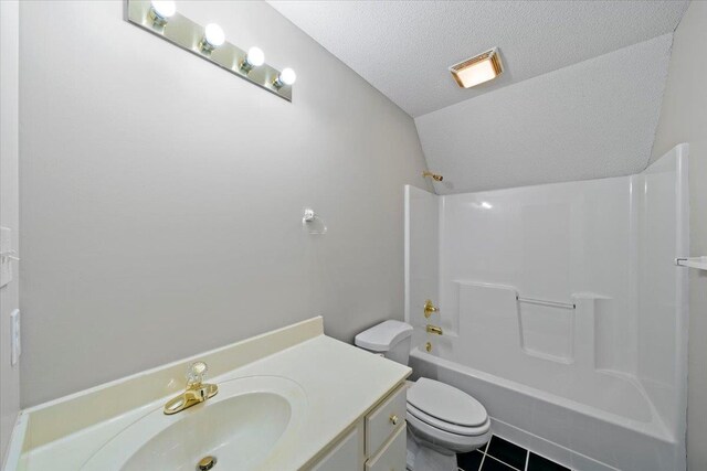 3559 Windgarden Cv, Memphis, TN 38125 - bathroom with toilet,  shower combination, lofted ceiling, vanity, and tile patterned floors
