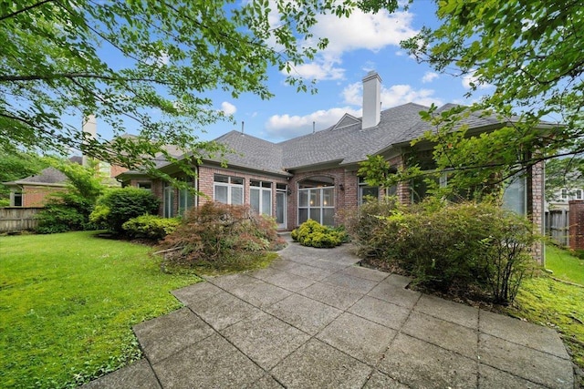 3559 Windgarden Cv, Memphis, TN 38125 - back of property featuring brick siding, a chimney, and a shingled roof