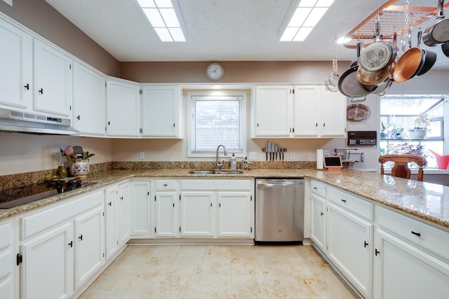 167 Ericson Rd, Memphis, TN 38018 - kitchen featuring stainless steel dishwasher, a sink, under cabinet range hood, black electric stovetop, and white cabinets