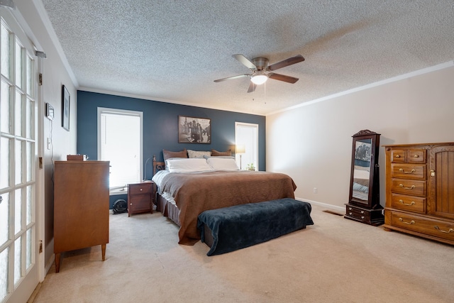 167 Ericson Rd, Memphis, TN 38018 - bedroom with ornamental molding, light carpet, a ceiling fan, a textured ceiling, and baseboards
