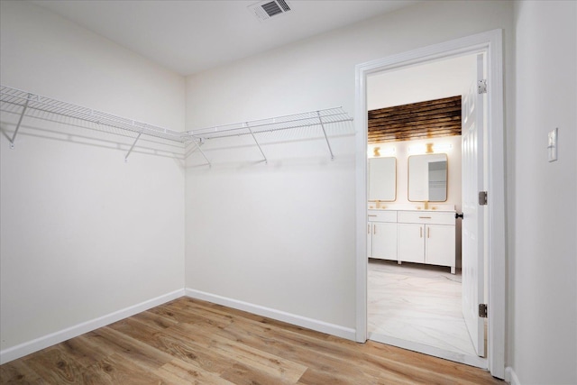 2551 Union Ave, Memphis, TN 38112 - walk in closet featuring light wood-type flooring