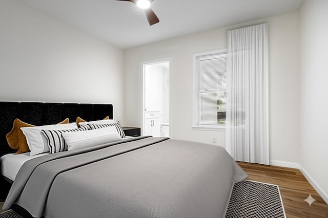 2551 Union Ave, Memphis, TN 38112 - bedroom with wood finished floors, baseboards, a ceiling fan, and ensuite bathroom