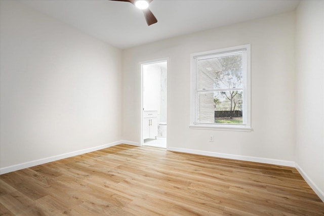 2551 Union Ave, Memphis, TN 38112 - empty room with a ceiling fan, light wood-style floors, and baseboards