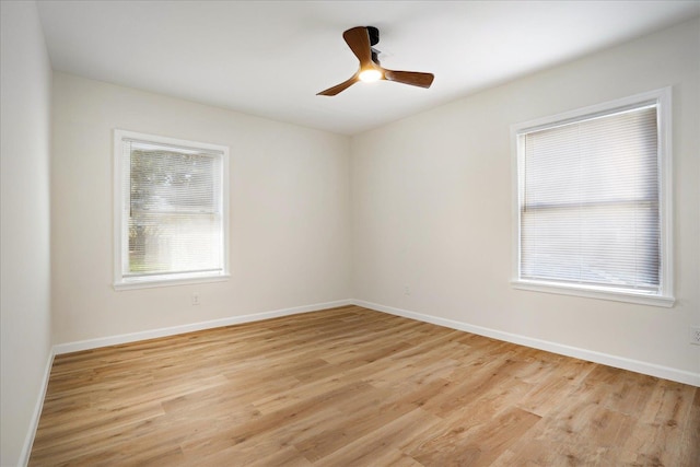 2551 Union Ave, Memphis, TN 38112 - unfurnished room featuring light wood finished floors, ceiling fan, and baseboards