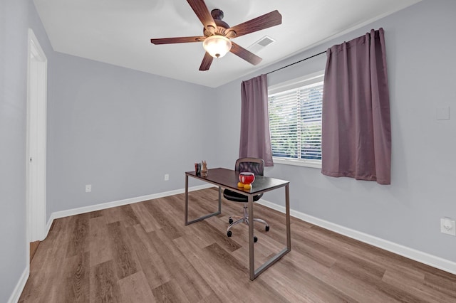 1822 Dragonfly Cv Unit 79, Germantown, TN 38138 - home office featuring wood finished floors, a ceiling fan, and baseboards