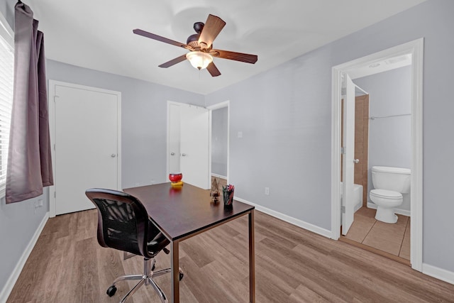 1822 Dragonfly Cv Unit 79, Germantown, TN 38138 - office featuring light wood-style floors, ceiling fan, and baseboards