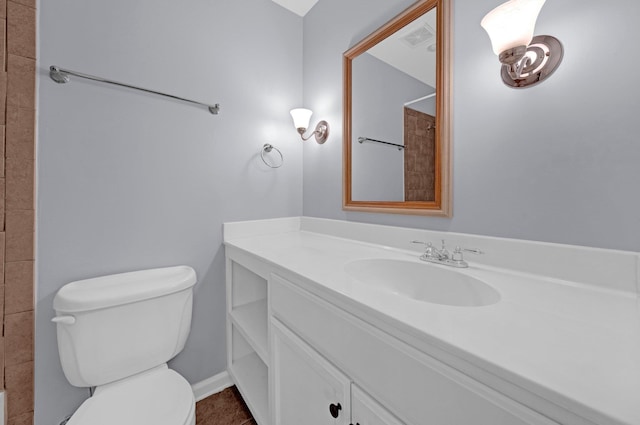 1822 Dragonfly Cv Unit 79, Germantown, TN 38138 - bathroom with vanity, toilet, a shower, baseboards, and tile patterned floors