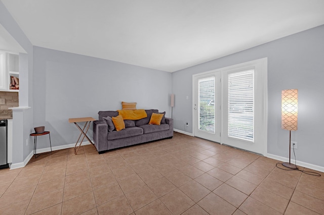 1822 Dragonfly Cv Unit 79, Germantown, TN 38138 - living room with light tile patterned floors and baseboards