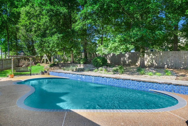 1620 Saddle Chase Cv, Memphis, TN 38016 - view of swimming pool with a fenced backyard