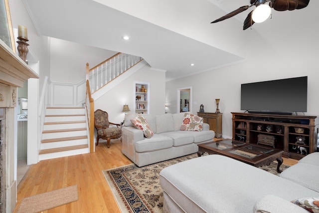 1620 Saddle Chase Cv, Memphis, TN 38016 - living area featuring stairway, ceiling fan, wood finished floors, recessed lighting, and ornamental molding