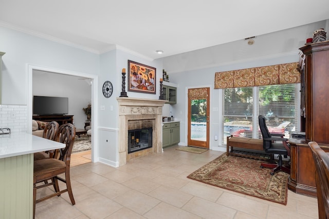 1620 Saddle Chase Cv, Memphis, TN 38016 - home office featuring ornamental molding, a fireplace, light tile patterned floors, and baseboards