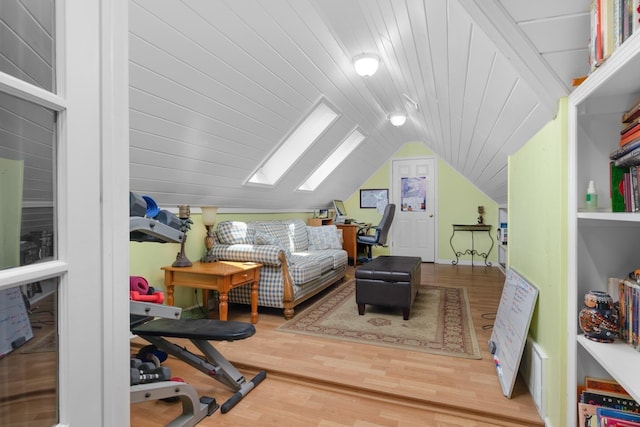 1620 Saddle Chase Cv, Memphis, TN 38016 - bedroom featuring vaulted ceiling, wood finished floors, and a skylight