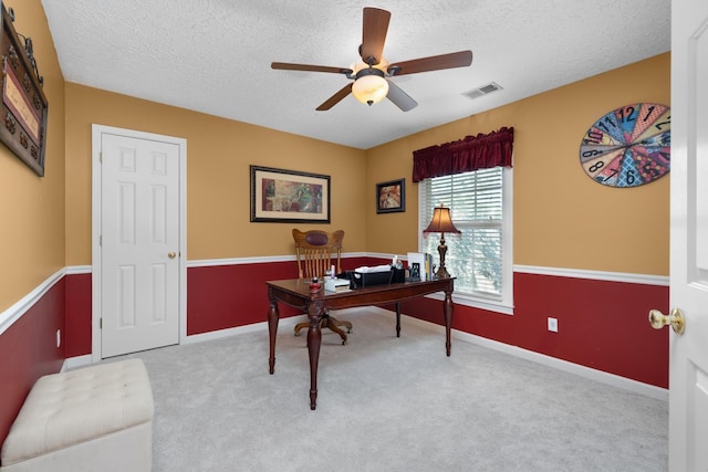 1620 Saddle Chase Cv, Memphis, TN 38016 - home office featuring a ceiling fan, a textured ceiling, light colored carpet, and baseboards