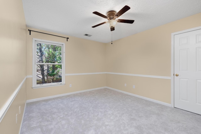 1620 Saddle Chase Cv, Memphis, TN 38016 - carpeted spare room with a ceiling fan, a textured ceiling, and baseboards
