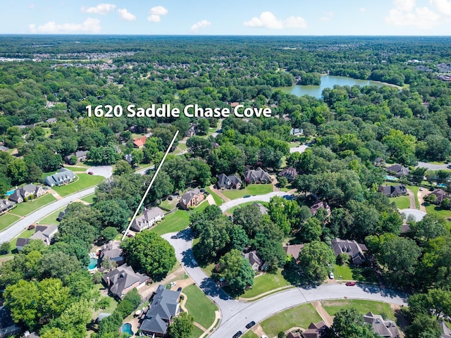 1620 Saddle Chase Cv, Memphis, TN 38016 - aerial overview of property's location with a forest, a nearby body of water, nearby suburban area, and property parcel outlined