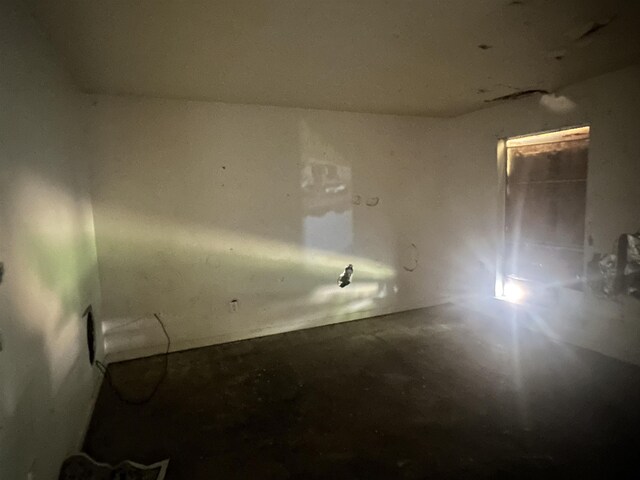 3421 Piney Woods Ave, Memphis, TN 38118 - spare room featuring concrete flooring