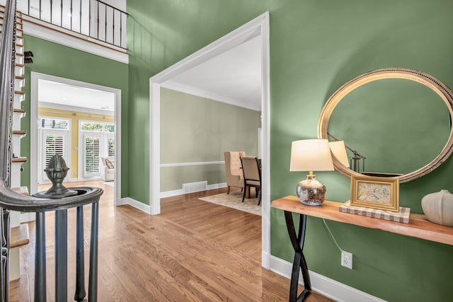 99 Red Acres Pl, Memphis, TN 38111 - entryway featuring ornamental molding, wood finished floors, and baseboards