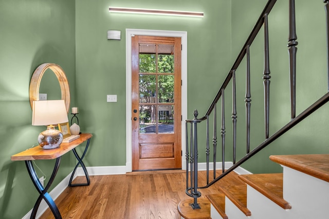 99 Red Acres Pl, Memphis, TN 38111 - entrance foyer featuring baseboards, wood finished floors, and stairs