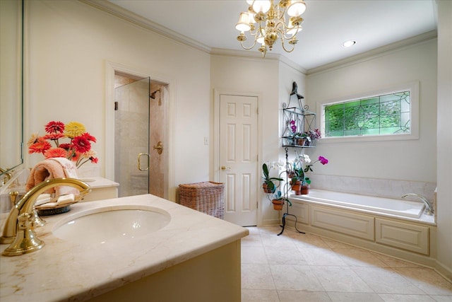 5239 Hedgewyck Ct, Memphis, TN 38117 - full bathroom featuring a garden tub, a shower stall, tile patterned flooring, vanity, and a chandelier
