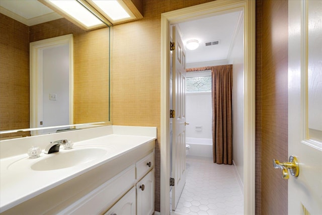5239 Hedgewyck Ct, Memphis, TN 38117 - bathroom with vanity, toilet, tile patterned floors, and a tub