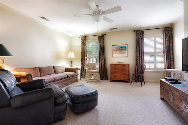 5239 Hedgewyck Ct, Memphis, TN 38117 - living room with crown molding, carpet flooring, ceiling fan, and baseboards
