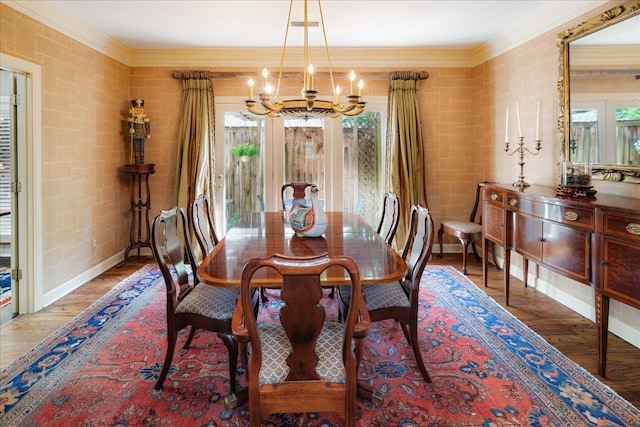 5239 Hedgewyck Ct, Memphis, TN 38117 - dining room featuring a chandelier, ornamental molding, and wood finished floors