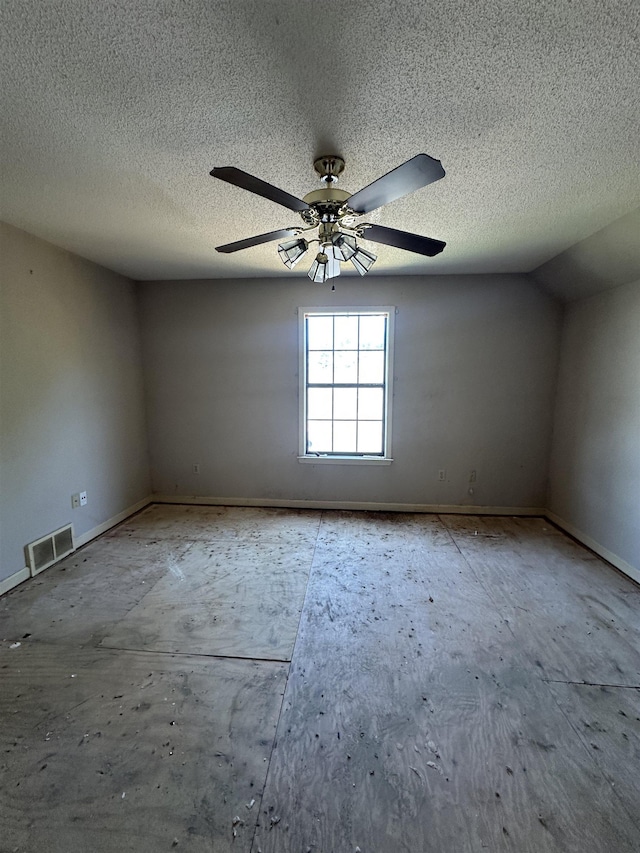 4378 Donnegan Cv, Memphis, TN 38125 - empty room with a textured ceiling, ceiling fan, and baseboards