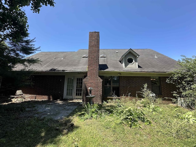 4378 Donnegan Cv, Memphis, TN 38125 - back of house with brick siding and a chimney